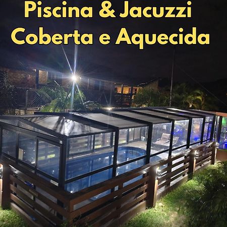 Hotel Praia Do Rosa Bagian luar foto