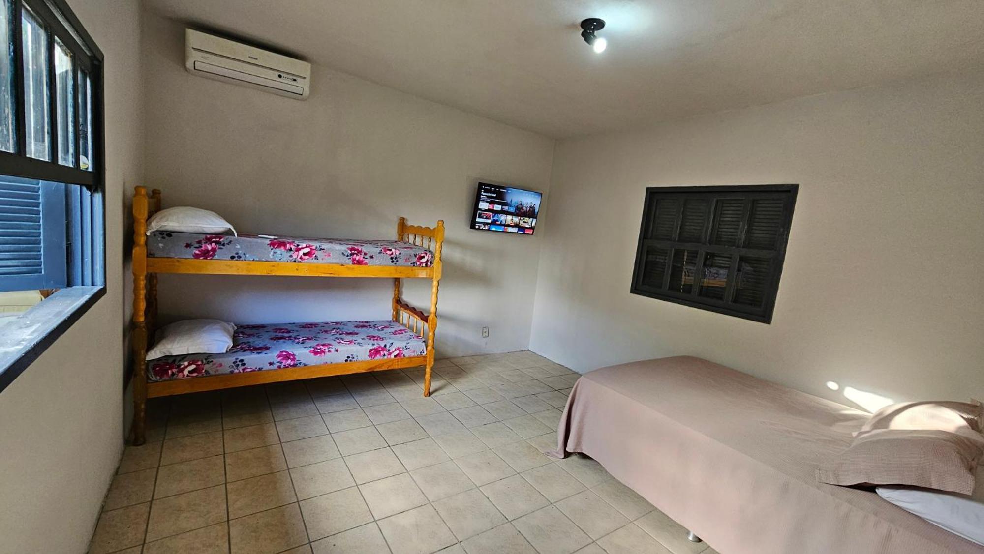 Hotel Praia Do Rosa Bagian luar foto